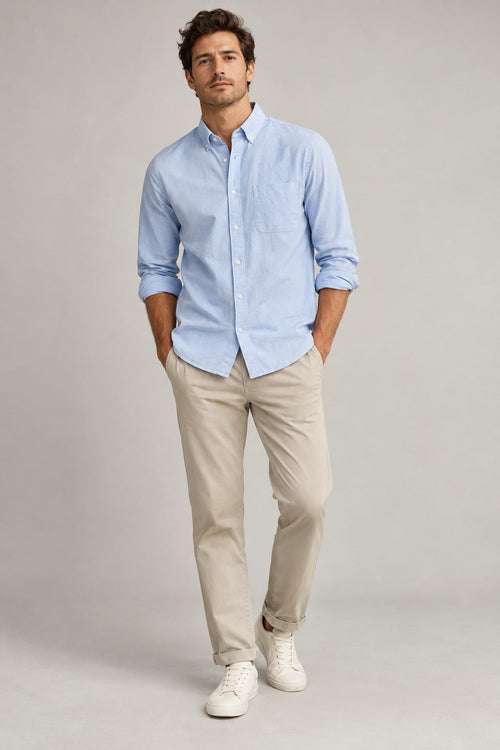 Male model wearing Northvale relaxed oxford shirt in light blue
